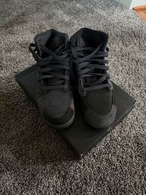 Jordan Kids Black High-Top Sneakers with Red Stitch Accents